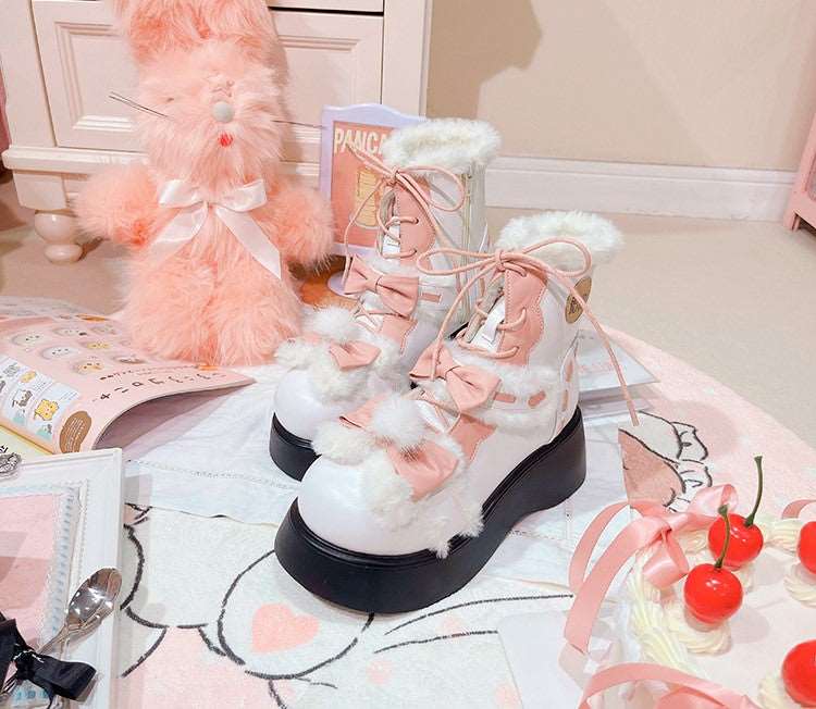 Pink and black boots sales