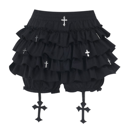 Black ruffled skirt with cross designs on a white background