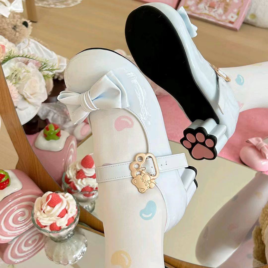 White shoe with decorative elements on a colorful background