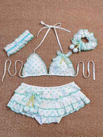 Women's bikini set with matching headband and hair accessories on a brown background