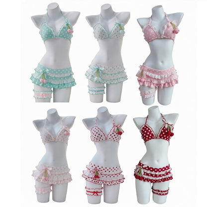 Set of women's lingerie on mannequins with pastel and red patterns.