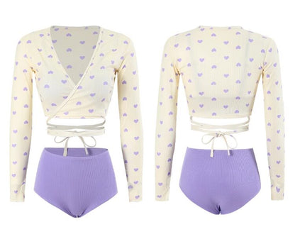 Two views of a two-piece outfit with a long-sleeve top and high-waisted shorts on a white background.