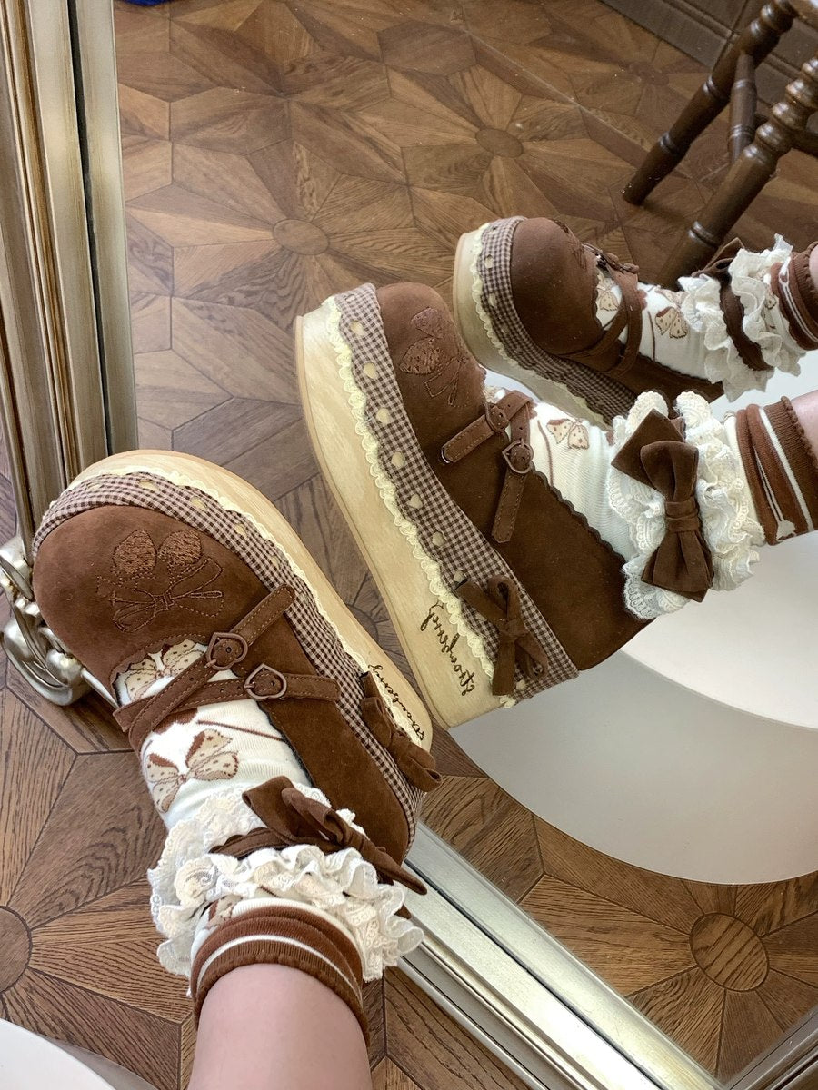 Cottagecore Brown platform shoes with white ruffles worn indoors on a wooden floor.