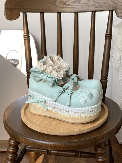 Cottagecore blue Decorative shoe with flowers on a wooden chair