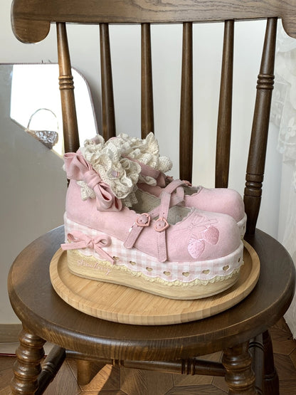 Cottagecore Pink decorative shoe with floral details on a wooden chair