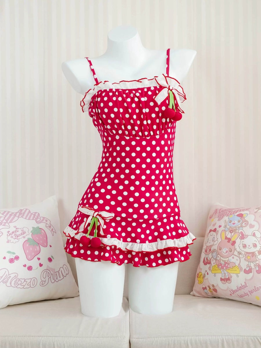 Red polka dot dress on a mannequin with a light background