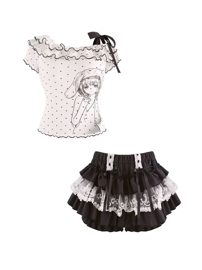 Children's outfit with polka dot top and black skirt on a white background
