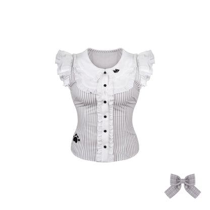 White blouse with ruffled sleeves and a small bow on a white background
