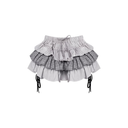 A three-layered striped mini skirt against a white background