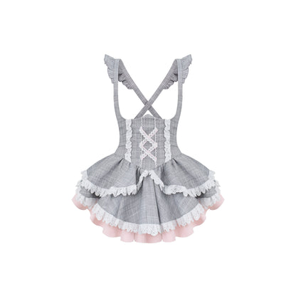 Gray checkered dress with white lace details on a white background