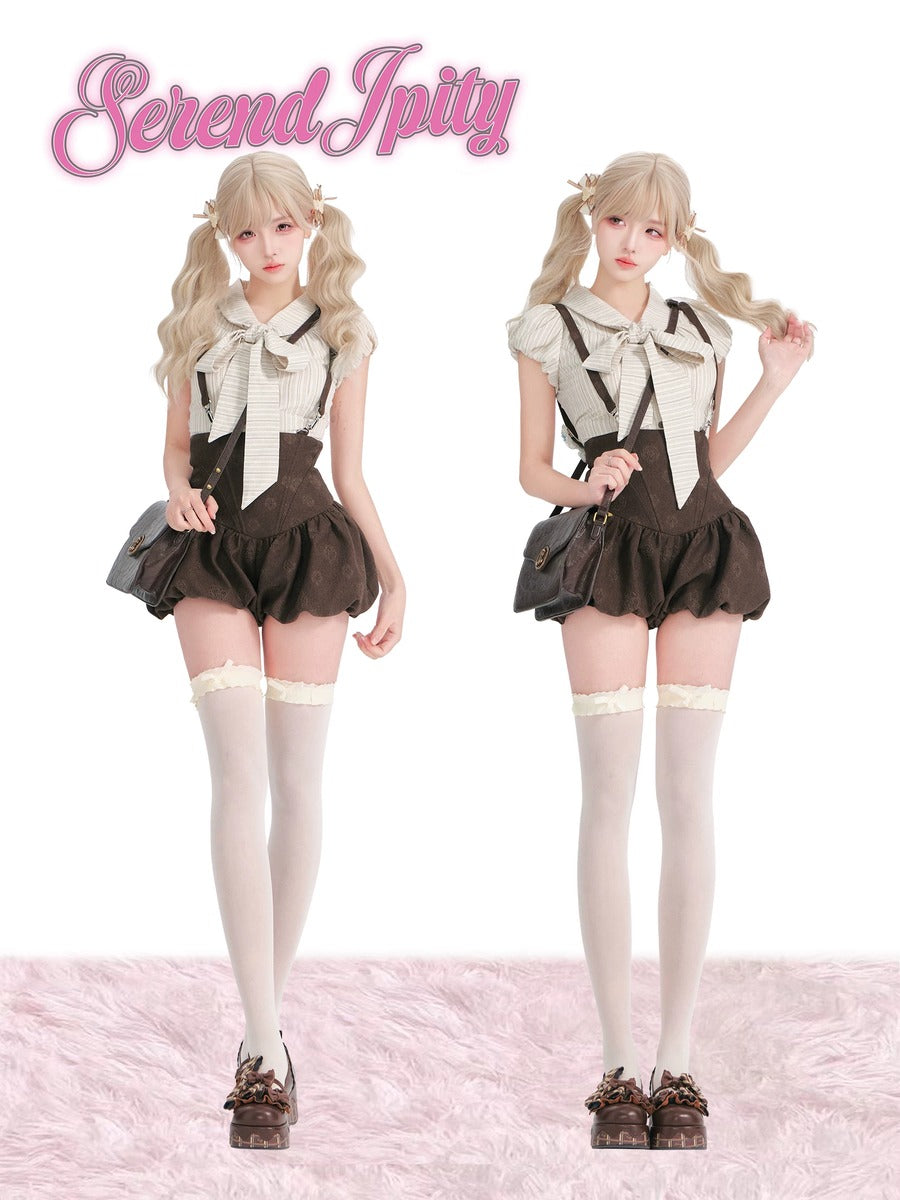 Two identical dolls in a brown and white outfit on a pink background.