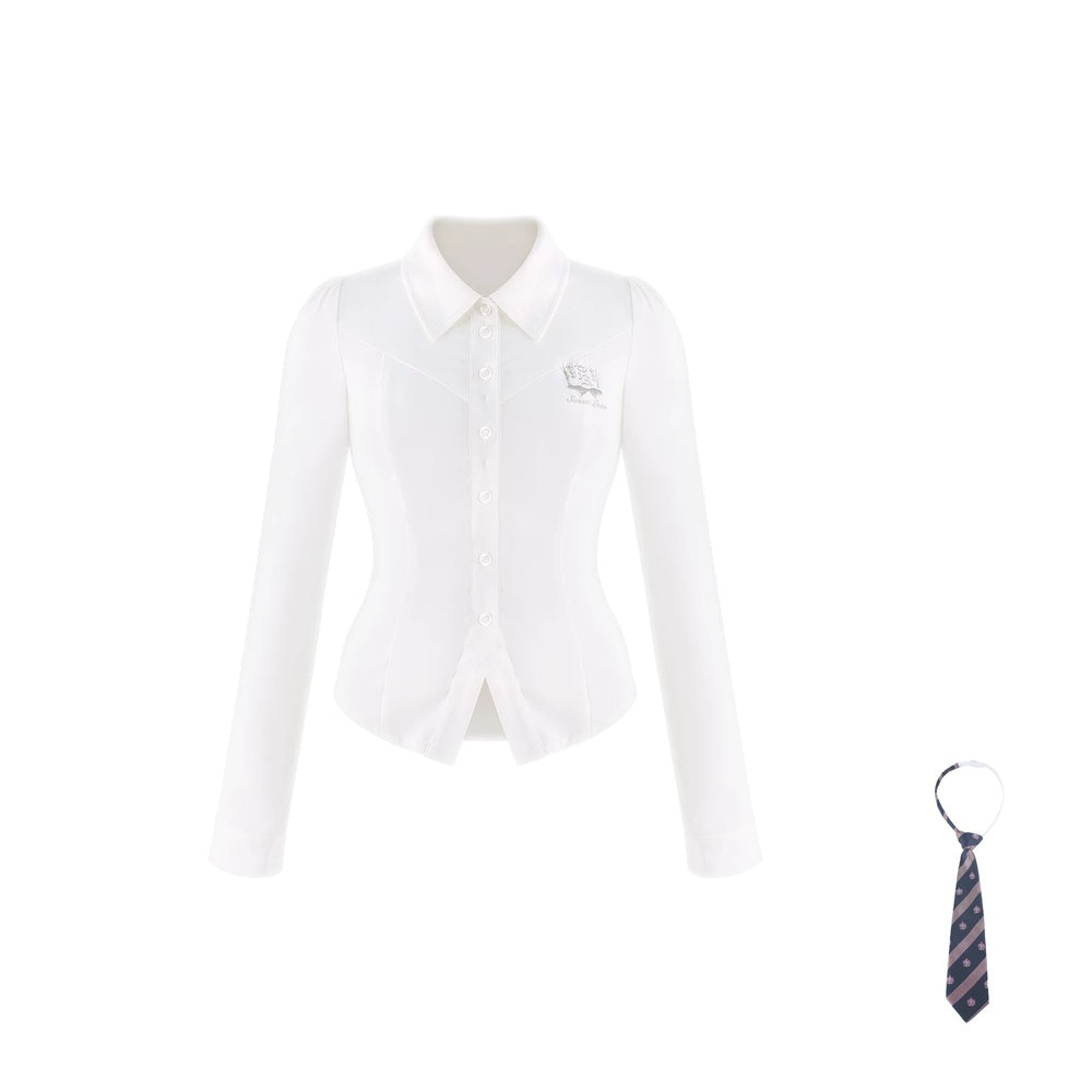 A white long-sleeve button-front collared blouse with a small embroidered chest logo, shown on a plain white background with a small striped necktie accessory at the lower right.