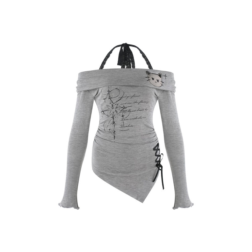 A light gray long-sleeve top with a unique asymmetrical wrap design, featuring black lace-up details on the side, a black braided strap at the neckline, and a small cat face graphic on the upper right shoulder.