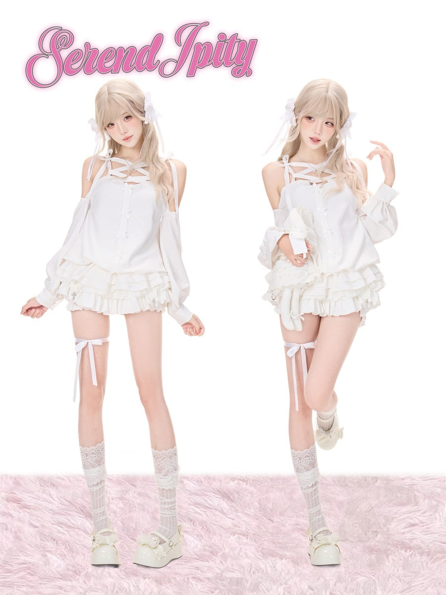Two models wearing matching white lolita-style outfits with ruffled mini dresses, lace-up halter tops, thigh-high stockings, and white shoes, posed against a white background with a pink fluffy rug