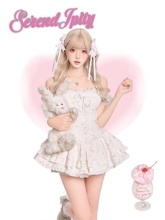 Person in a light dress holding a plush toy on a pink background