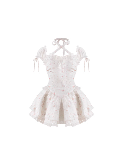White lace dress with bow straps on a white background