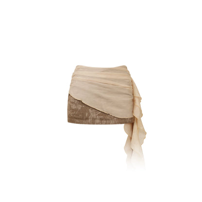 Beige and brown layered skirt on a white background