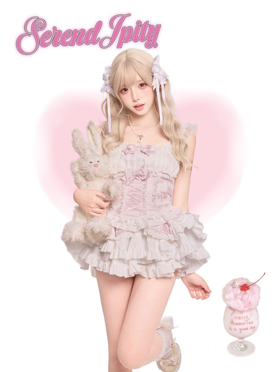 Person in a frilly outfit on a pink background