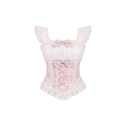 Pink lace cami with ruffles on a white background
