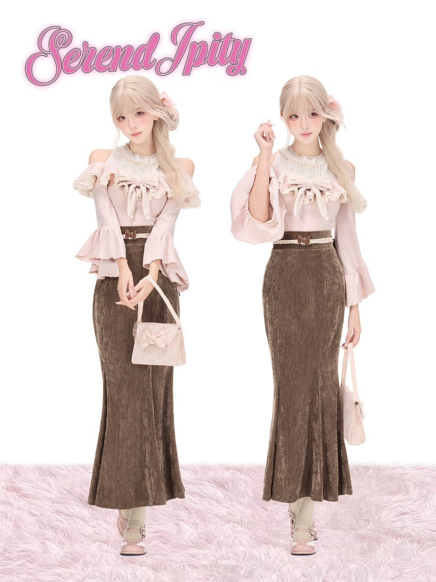 Two views of a model wearing a two-piece outfit from Serend Jpity, featuring a light pink off-the-shoulder ruffled blouse and a brown textured mermaid-style skirt, set against a white background with a pink faux fur floor.