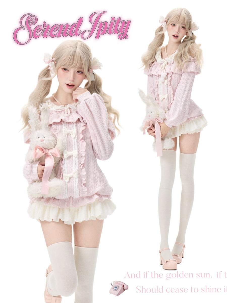 A fashion model with long blonde pigtails is shown in two poses wearing a pastel pink and white frilly Lolita-style outfit with thigh-high socks. The image has 'Serendipity' and decorative text on a plain white background.