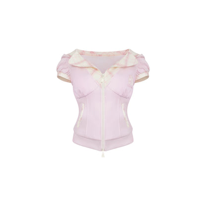 Pink top with floral pattern on a white background