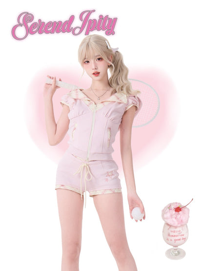 Person wearing a pink sport outfit, holding a dessert.