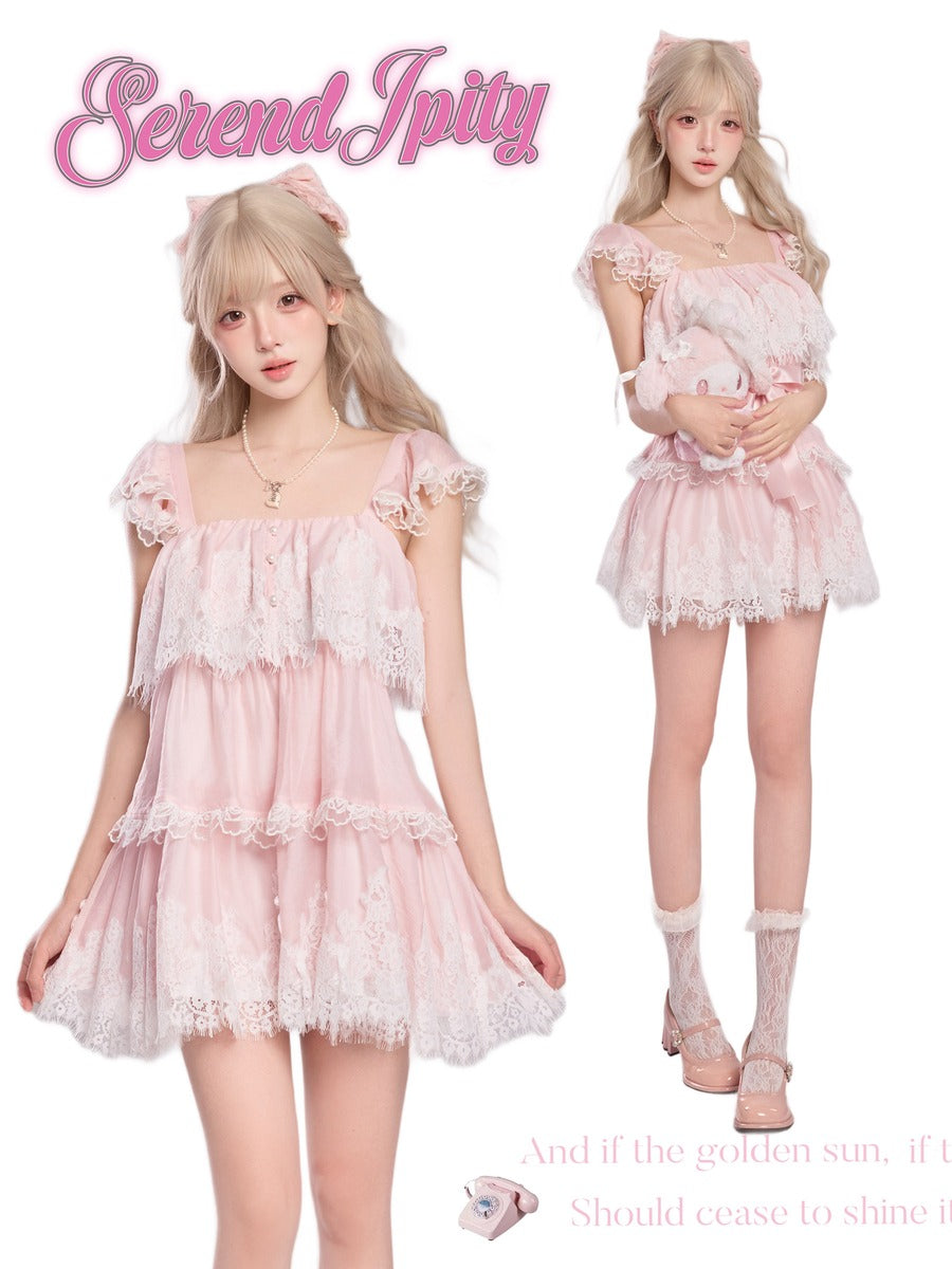 Two models wearing a pink lace dress