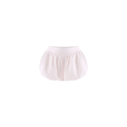 Light pink shorts on a white background