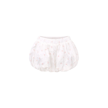 White baby bloomers with pink floral pattern on a white background