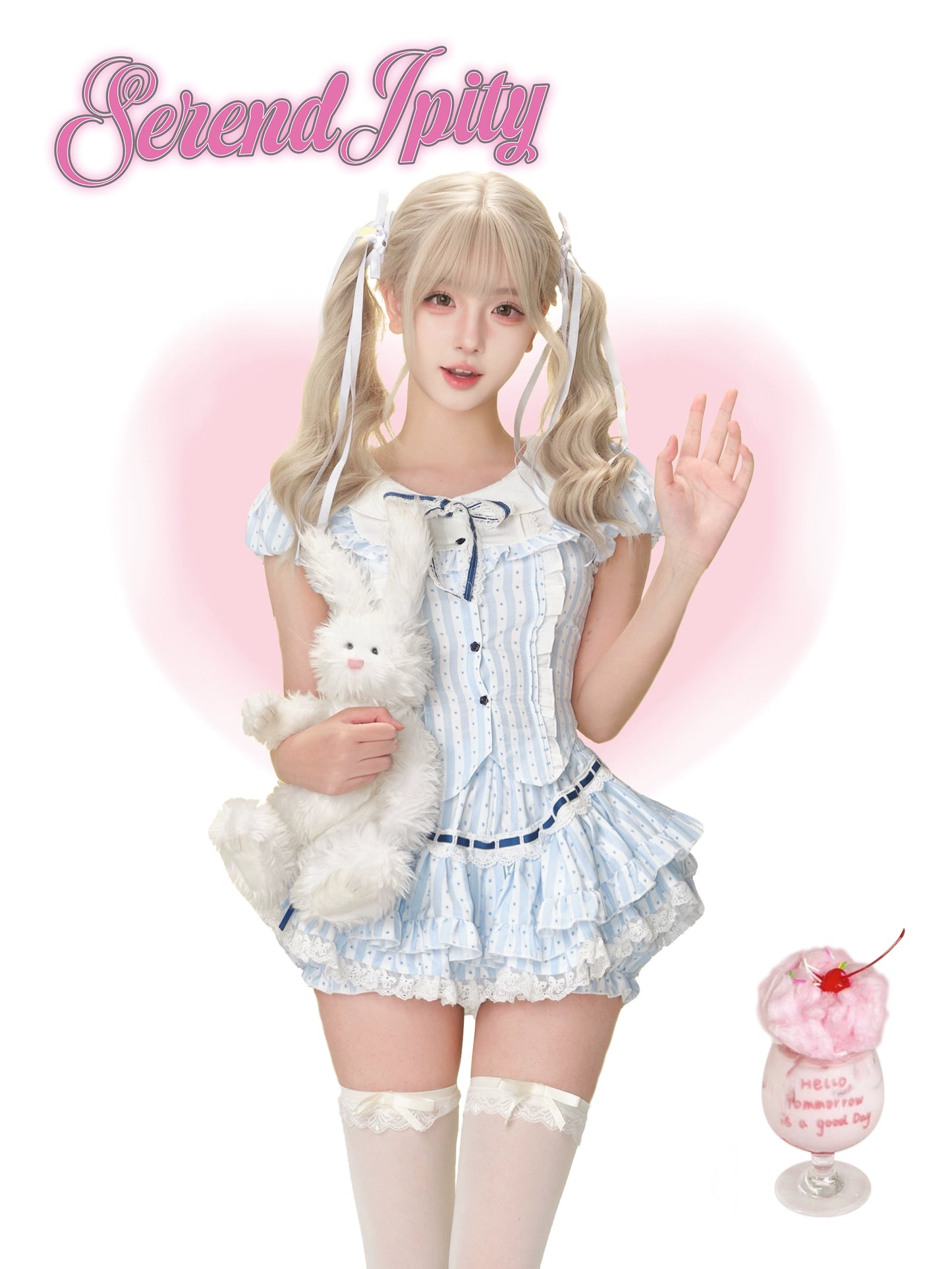 blue polka-dot top with Peter Pan collar and matching pleated skirt