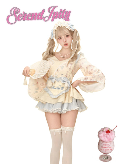 cream hanfu kimono top with rabbit and balloon print and blue-edged skirt