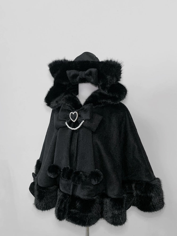 Black hooded coat with fur trim on a white background