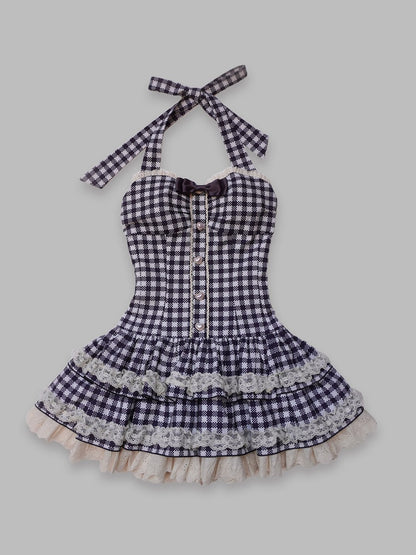Checkered dress with lace trim on a light gray background