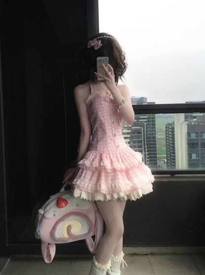 Person wearing a pink dress with a cityscape in the background