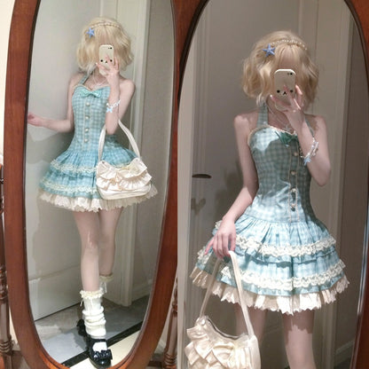 Person wearing a checkered dress with ruffles in front of a mirror.
