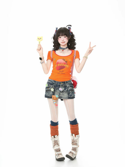 Person wearing an orange shirt, denim overalls, and colorful socks on a white background