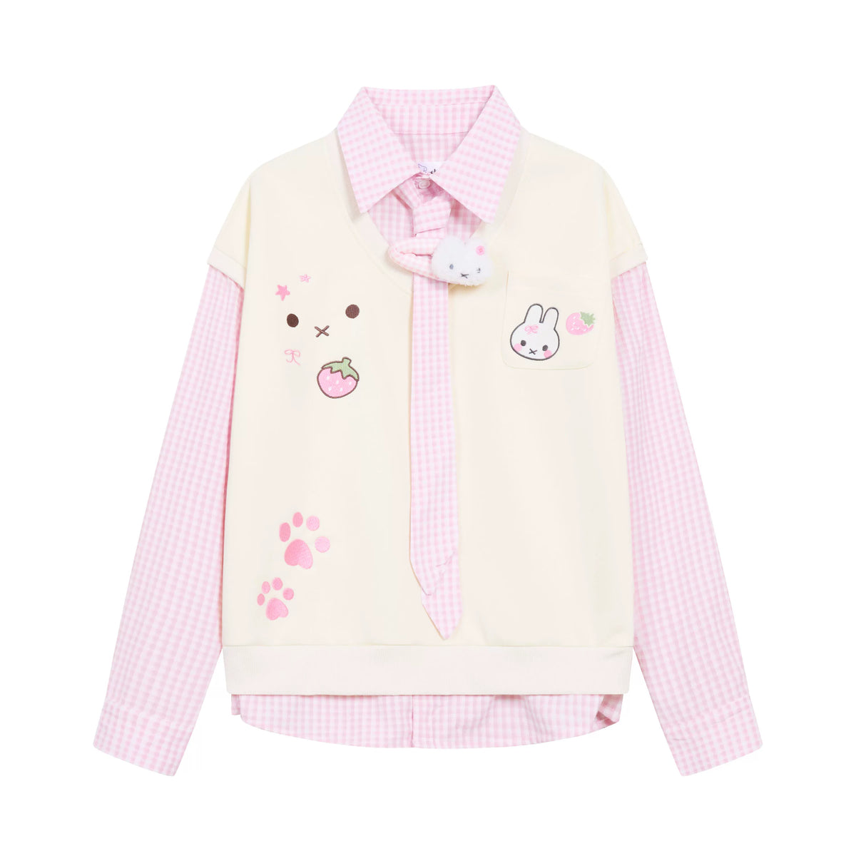 A pastel pink and cream long-sleeve collared shirt jacket with cute cartoon bunny and strawberry graphics, pink paw prints, and a matching pink gingham pattern on the sleeves and collar.