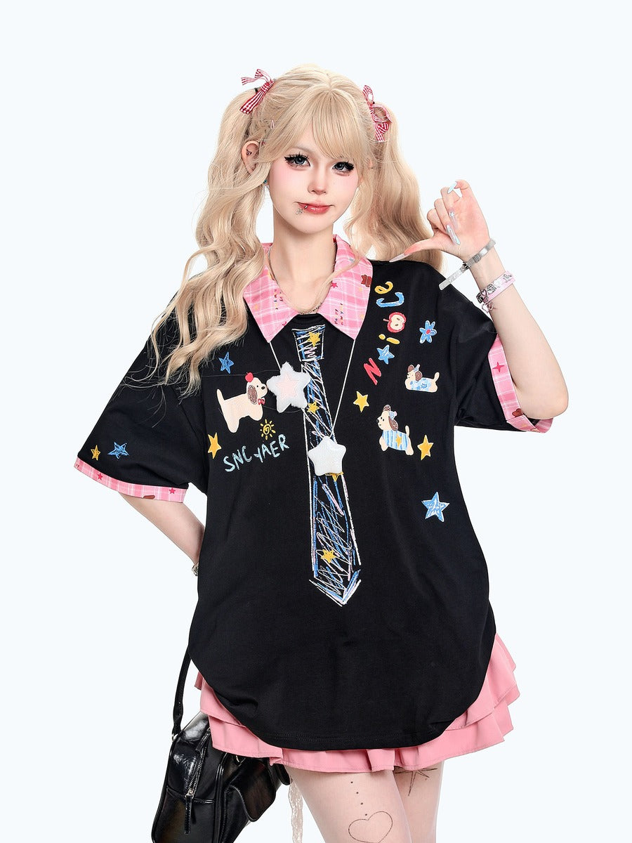 Person wearing a black shirt with colorful designs and pink accents on a white background