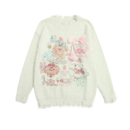 A pale mint green fuzzy knit sweater with a distressed frayed hem, featuring a cute cartoon bear graphic and a large pink bow on the front, displayed against a solid white background.