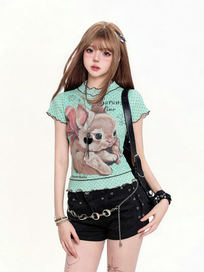 Person wearing a t-shirt with a cat design on a white background