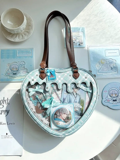 Heart-shaped handbag with character illustrations on a light surface