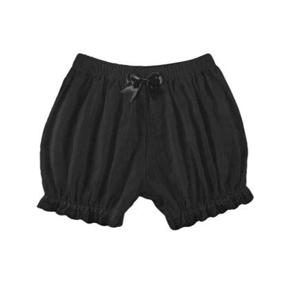 Black baby bloomers with a bow on a white background