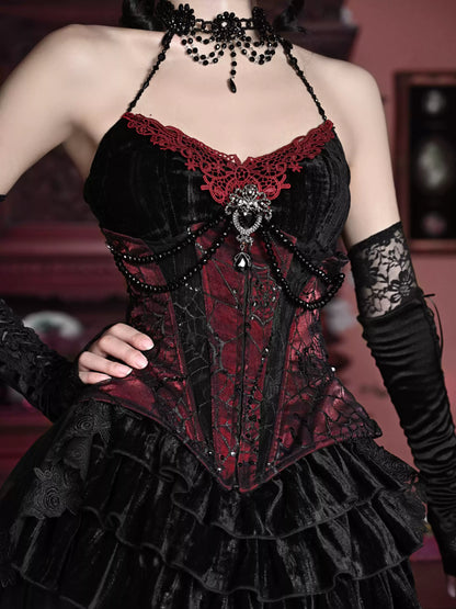 Gothic-style corset with red and black lace details on a blurred background