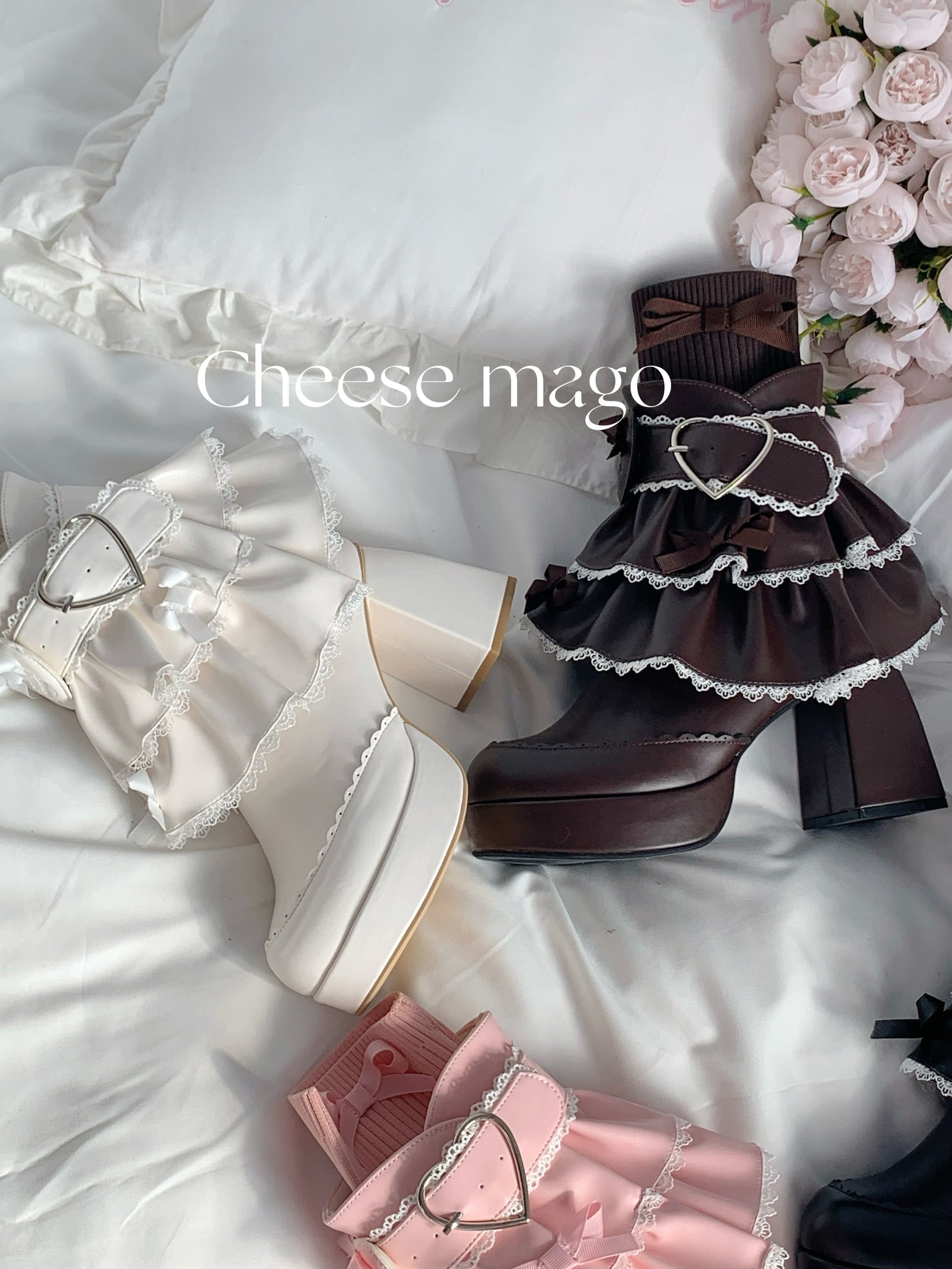 Pair of ruffled shoes on a white surface with 'Cheese mago' branding.