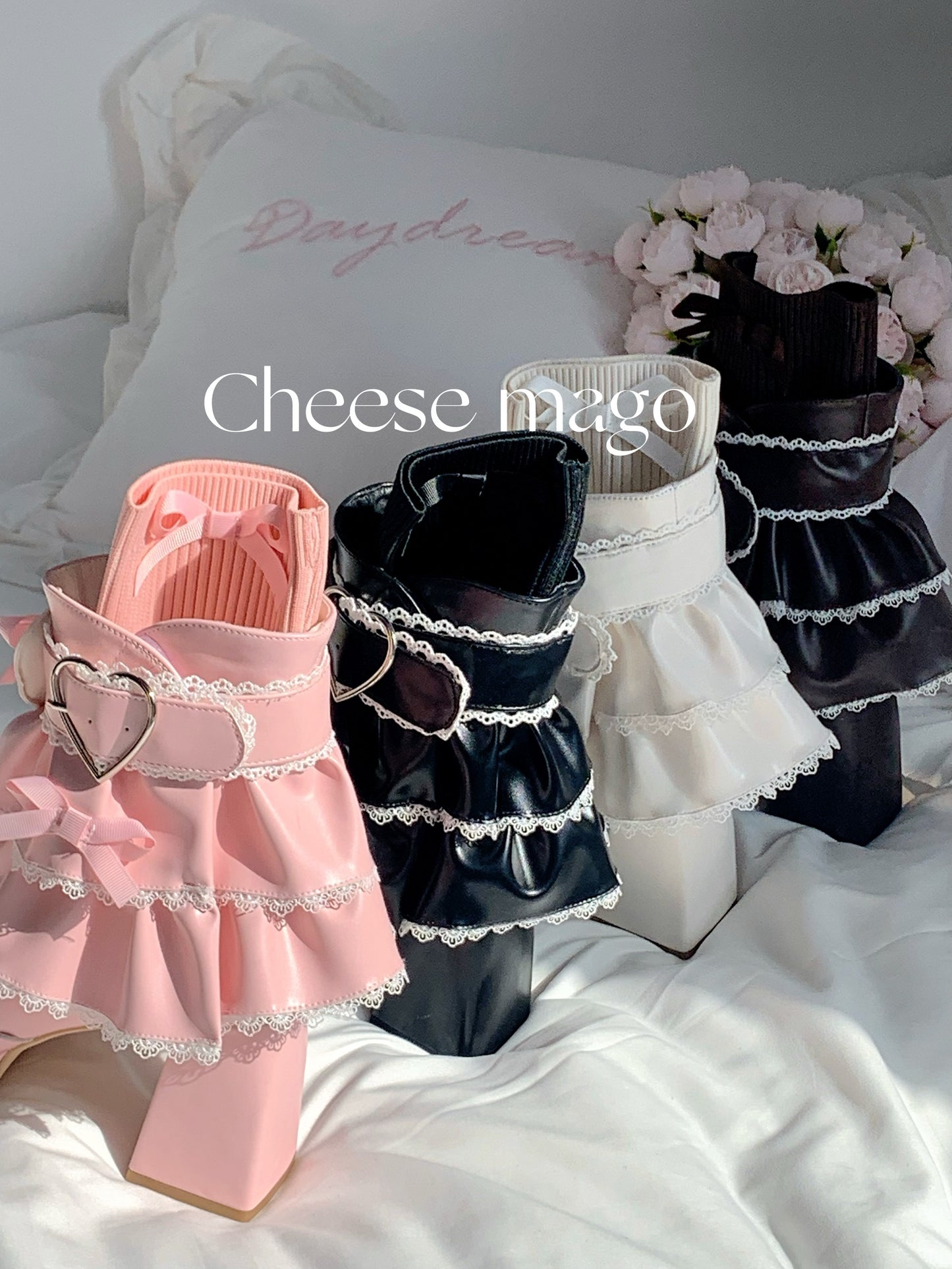 Three pet outfits in pink, black, and white on a white surface with 'Cheese mago' branding.