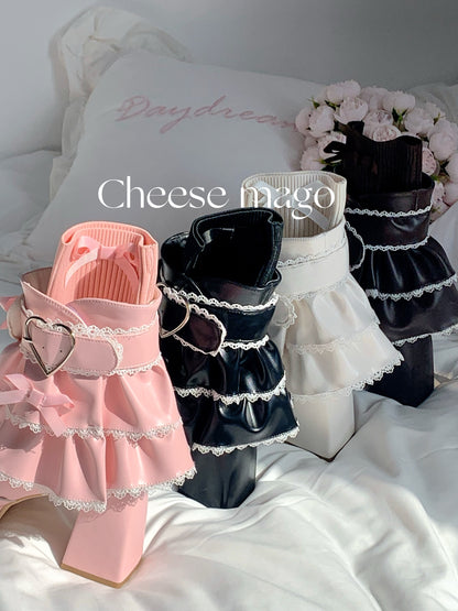 Three pet outfits in pink, black, and white on a white surface with 'Cheese mago' branding.