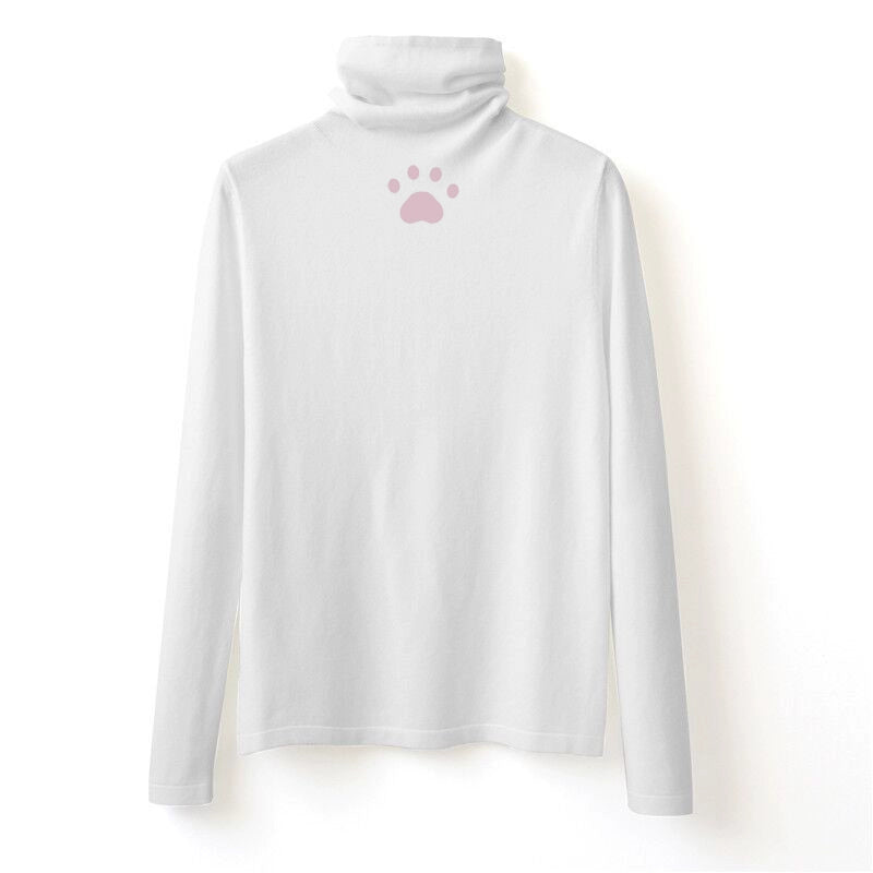 White turtleneck sweater with a pink paw print on a white background