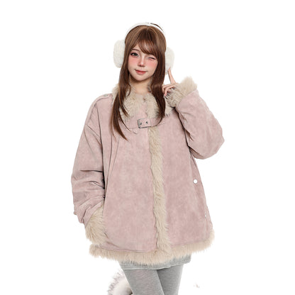 Person wearing a pink winter coat with fur trim and white earmuffs on a white background