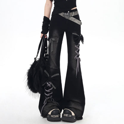 Black gothic-style pants with lace-up design on a white background